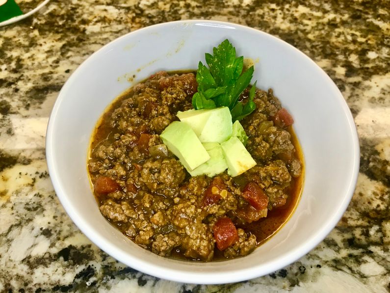 A paleo Pumpkin Chili that is Whole30 approved. Just imagine coming home to that delicious aroma and having dinner ready to serve on a cool fall night.